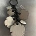 Coach tea rose bag charm