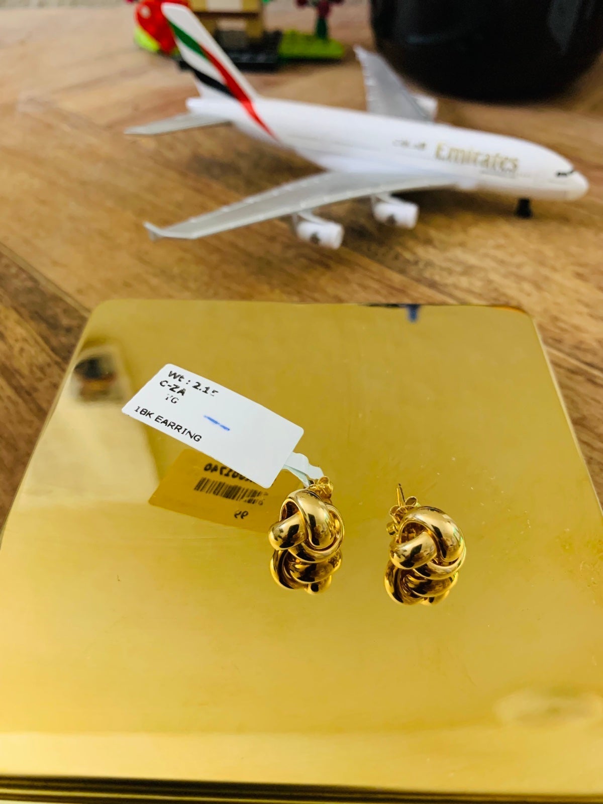 Love Knott earrings. 18K real Saudi Gold