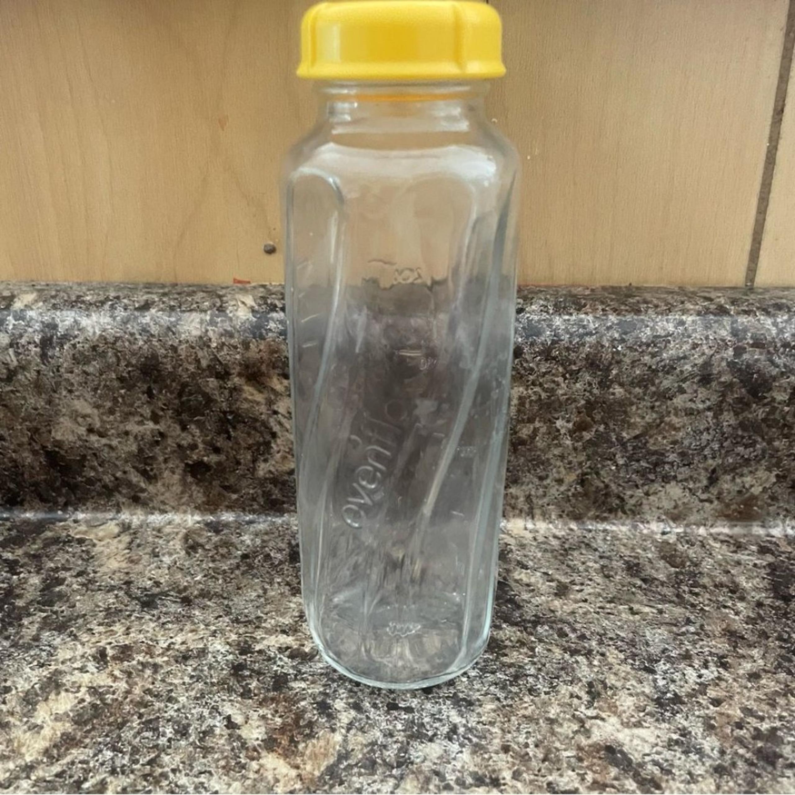 Evenflo Glass baby Bottle used Medela lid