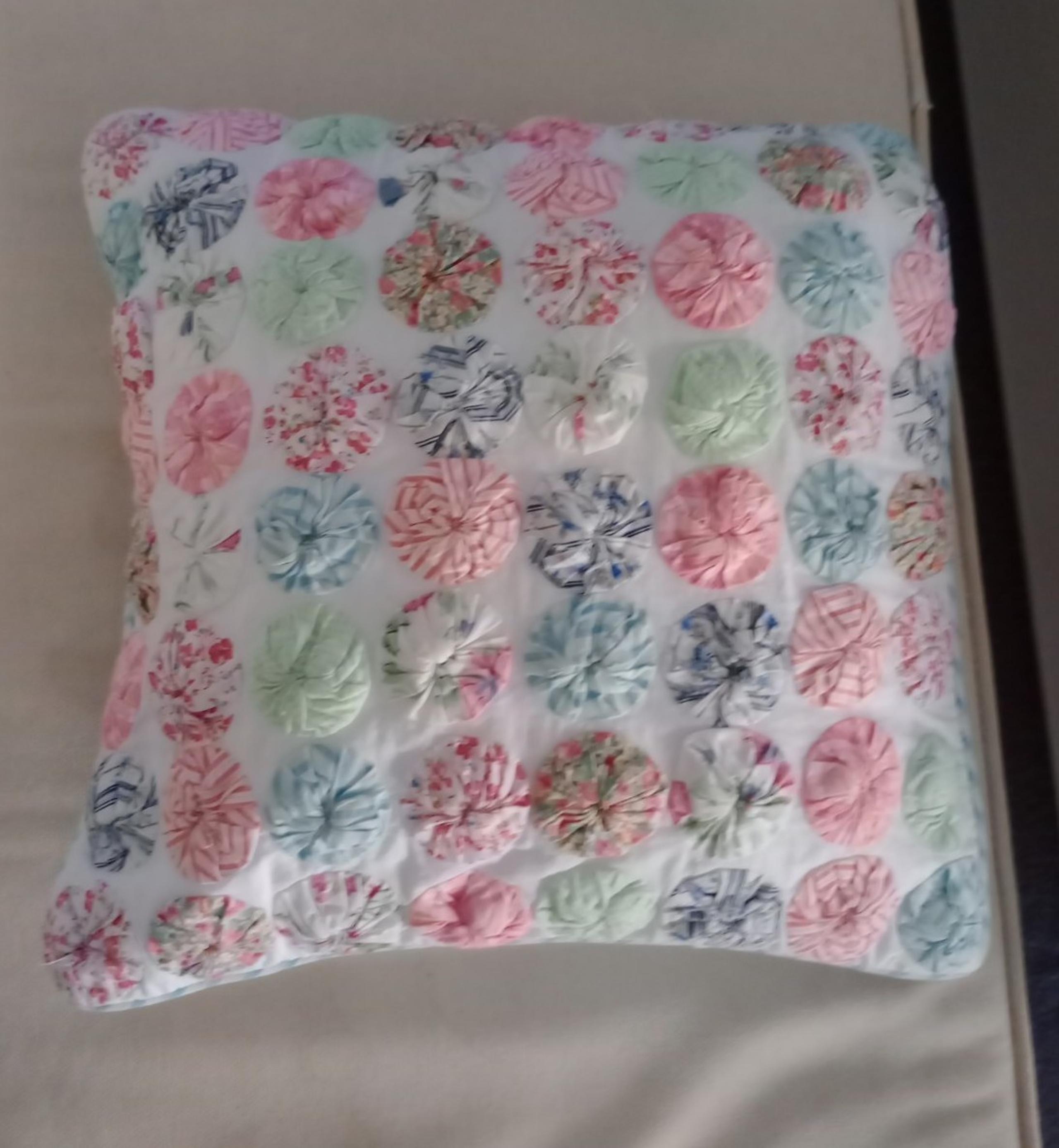 Ethan Allen down textured circle design pillow 16x16 with stripes on reverse