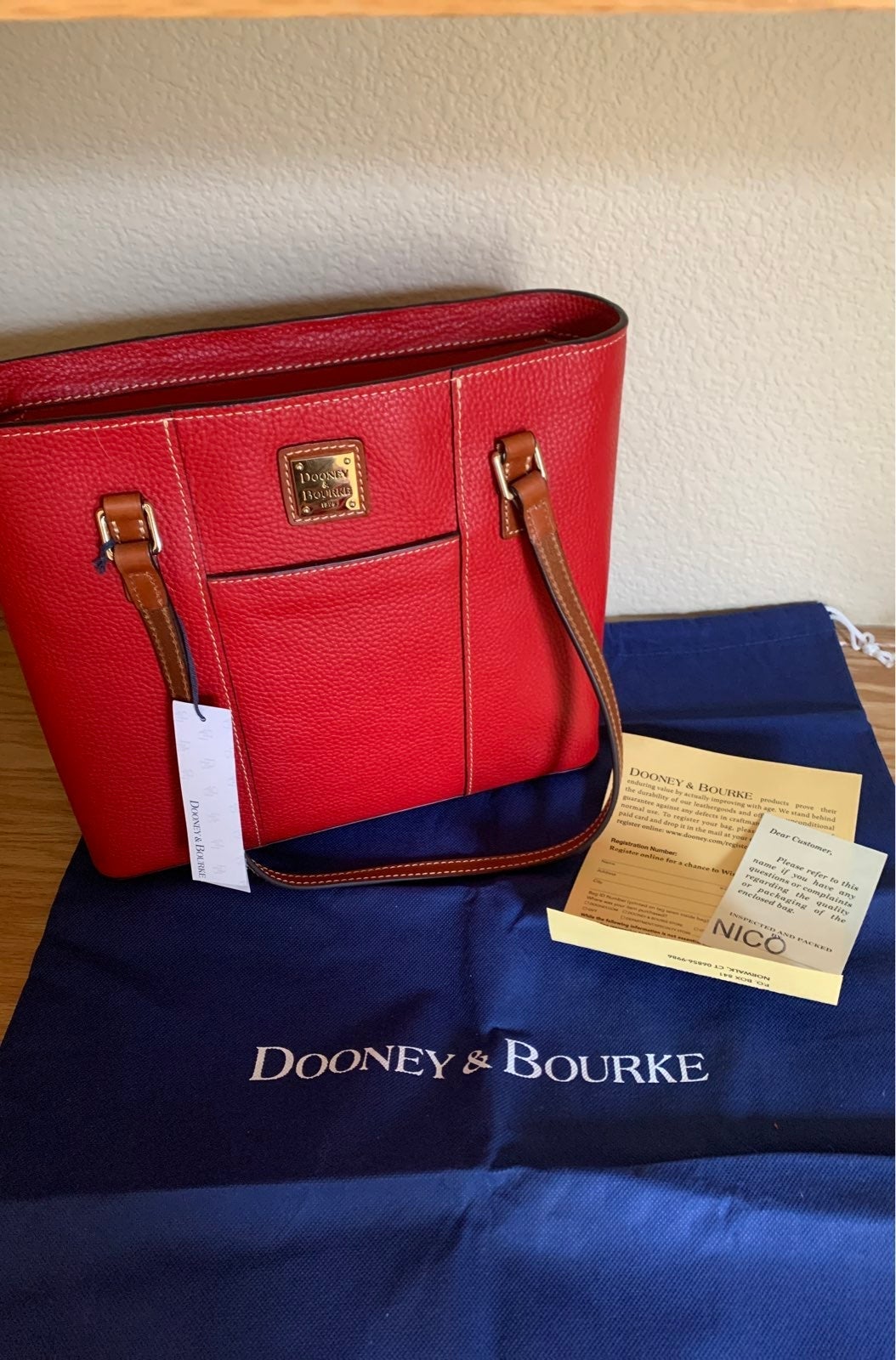 Dooney and Bourke red pebble handbag