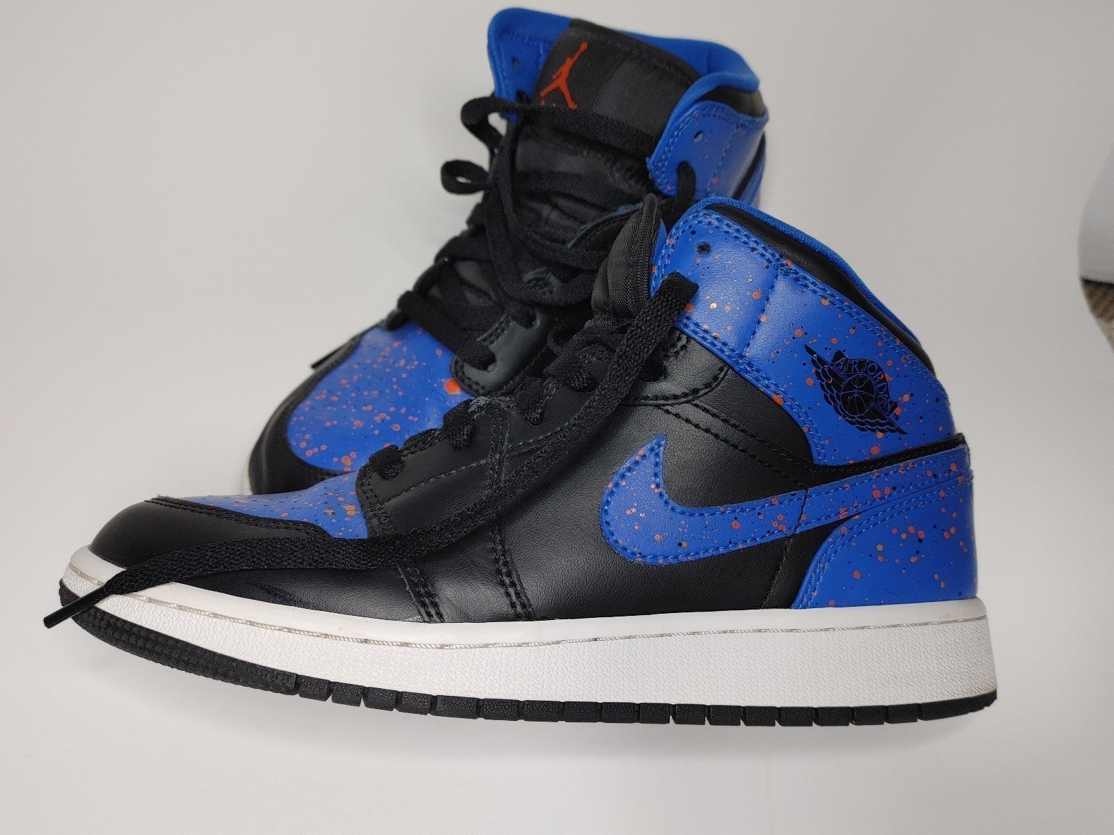 Air Jordan 1 “Royal Splatter” mid top