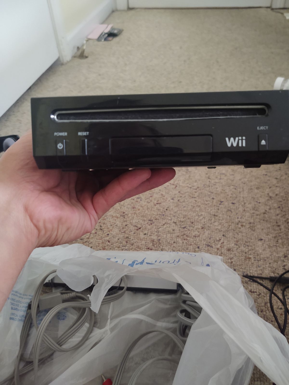 Nintendo Wii with controllers and charge