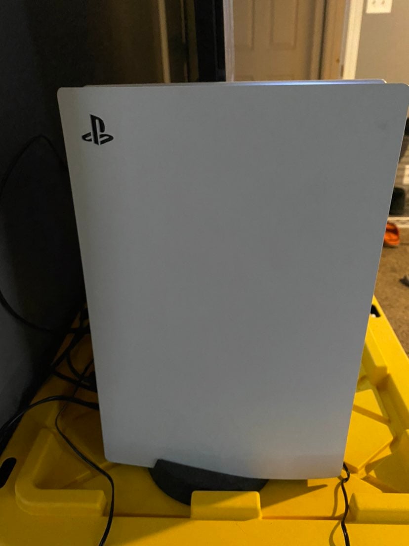 Used Playstation 5 with controller charging station and controller