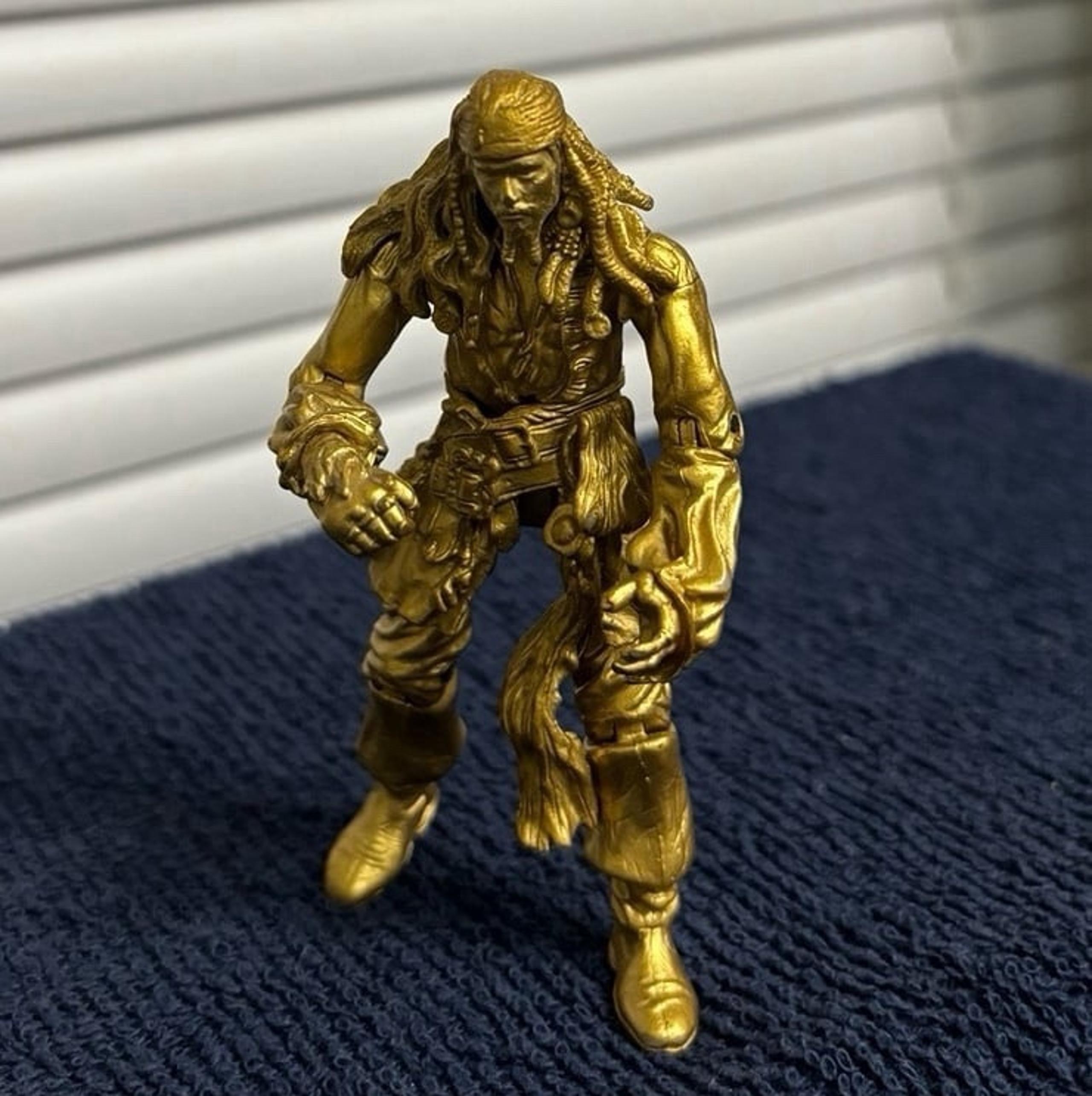 Disney Pirates of the Caribbean Gold Jack Sparrow 4”Action Figure