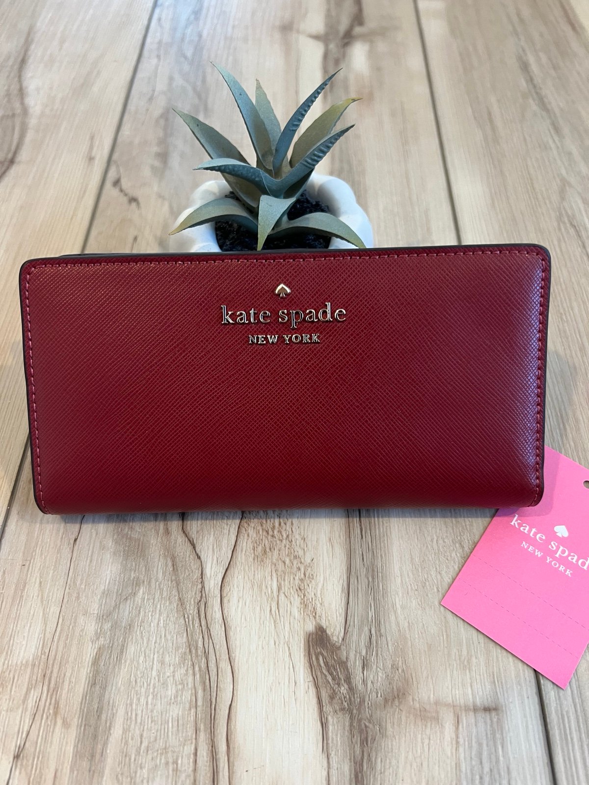 NWT Kate Spade lg slim bifold wallet red