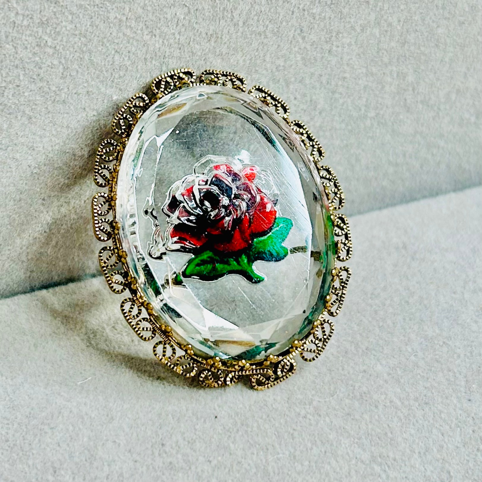 Vintage Faceted Glass Reverse Etched Rose Brooch in Gold Tone Filigree Frame