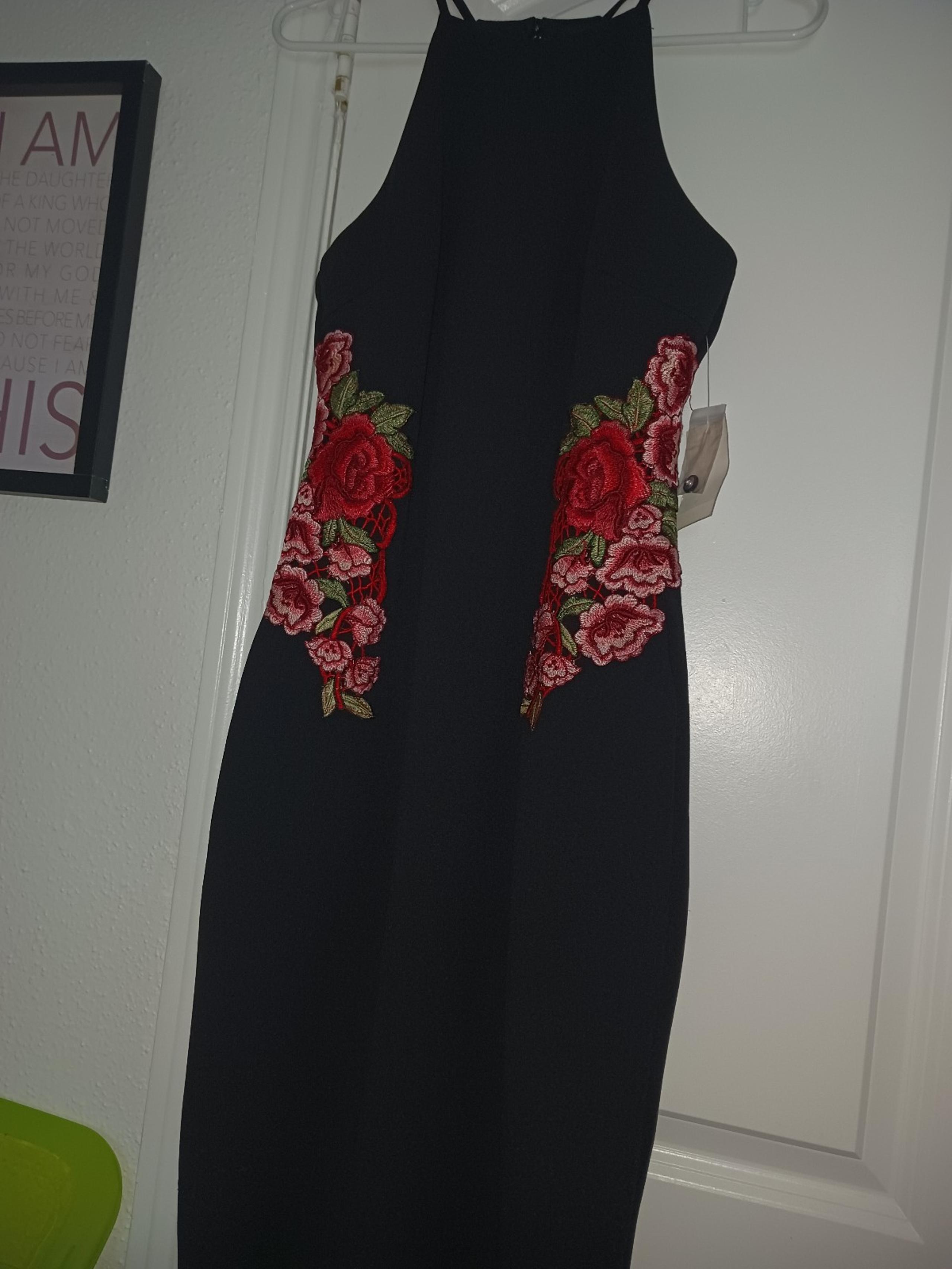 Black Cocktail Dress with Rose Accents on The Side