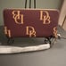 NWT Dooney & Bourke Large Zip Around Monogram Wine Wristlet