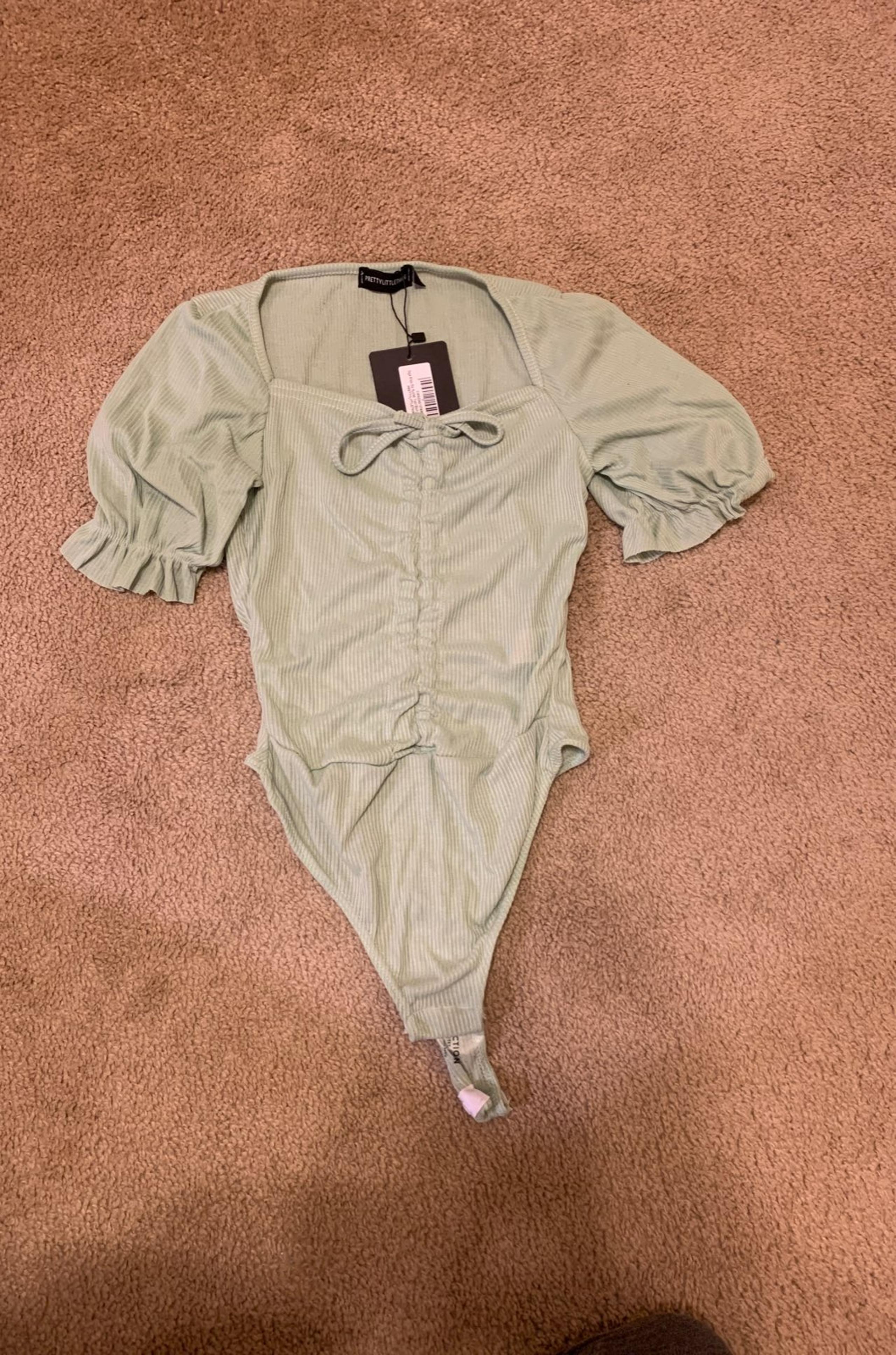 Green bodysuit