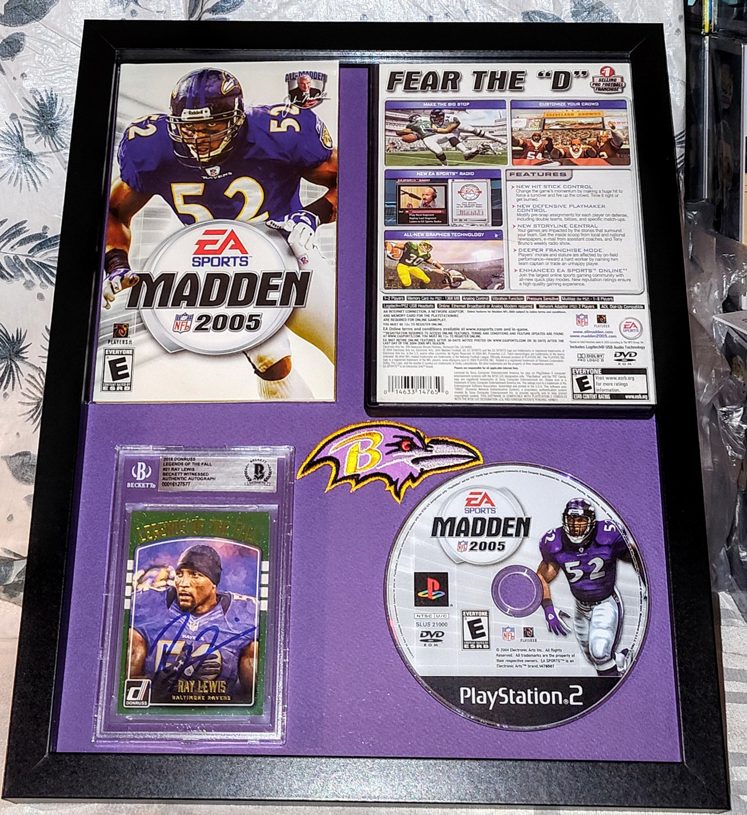 Autographed Ray Lewis Madden football video game display