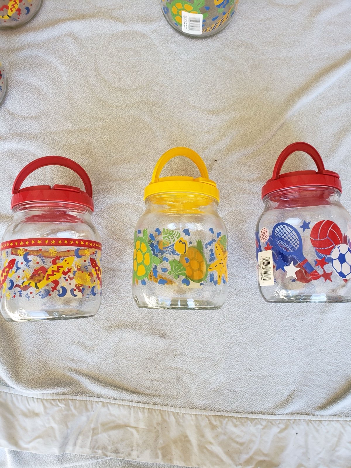 11 BRAND NEW GLASS 1/2 GALLON DRINK CONTAINER W/HANDLE AND SPOUT.