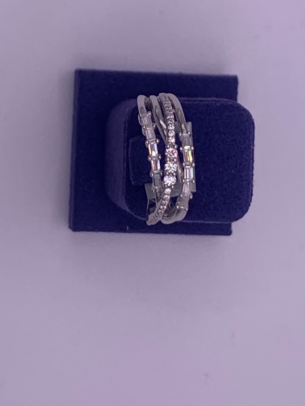 Crossed Moissanite rings