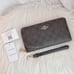 NWT Coach Long Zip Around Wallet Wristlet In Signature Canvas Brown Black C4452