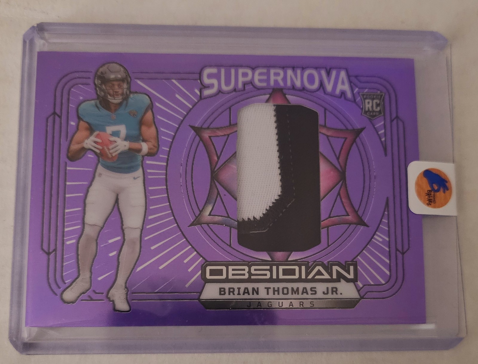 Brian Thomas Jr. 2024 Panini Obsidian NFL RC Purple /49 Supernova Patch 2-Color