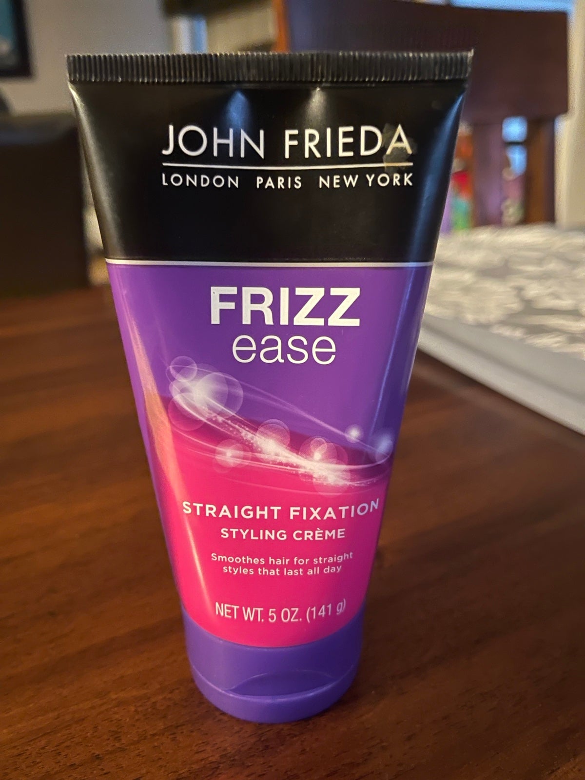 Frizz ease straight fixation styling creme top