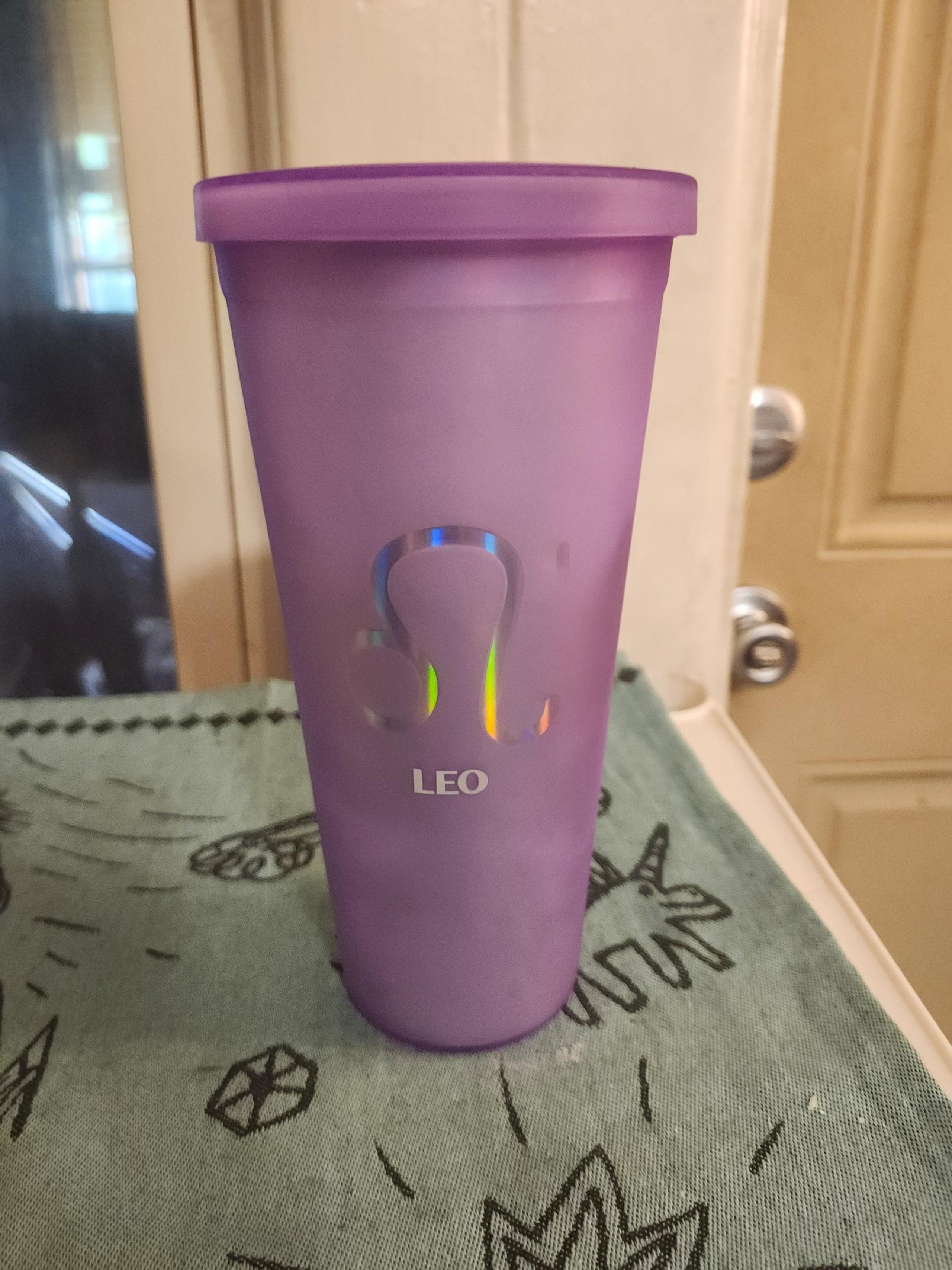 A purple cup with the astrological sign for Leo ♌️