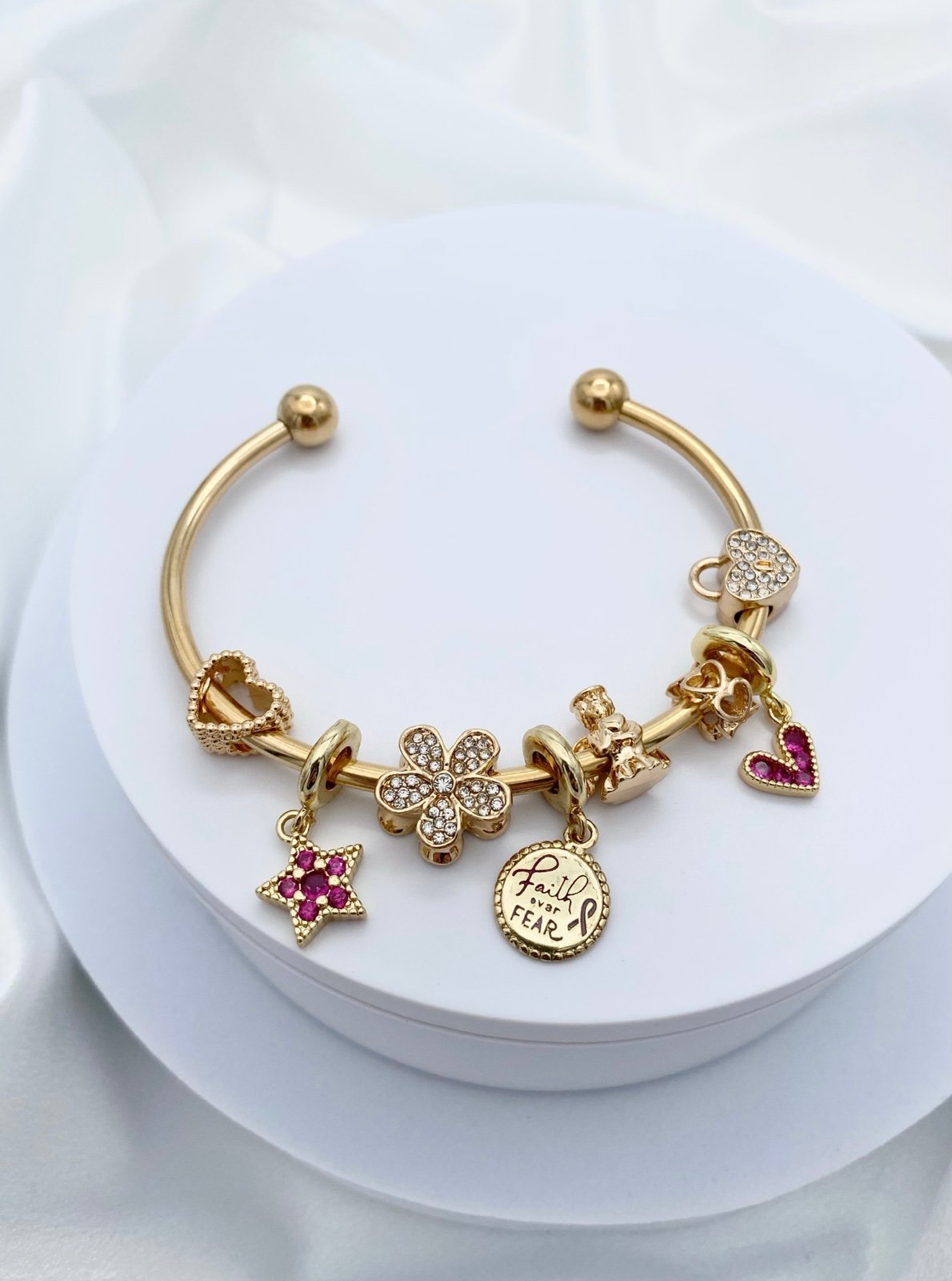 Linx Yellow Gold Stainless Steel Open Bangle with Breast Cancer Awareness Charms