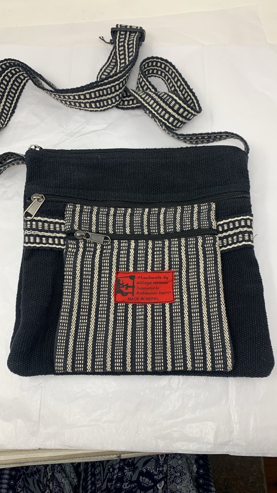 Kathmandu sling bag sales