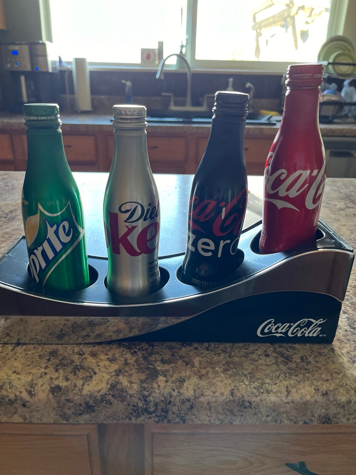 Coca Cola bottle holder with 4 aluminum bottles