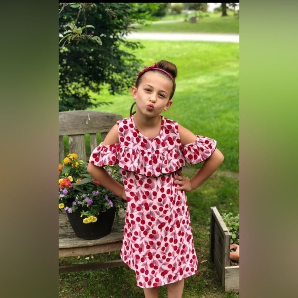 Kate Spade pink red cold shoulder dress in a cherry pattern size 10y