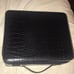 Estee Lauder crocodile print travel purse