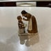 Norman Rockwell mother giving medicine figurine