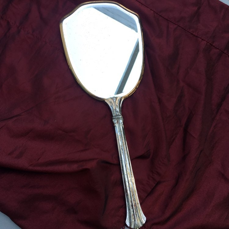 Vintage silver handheld mirror