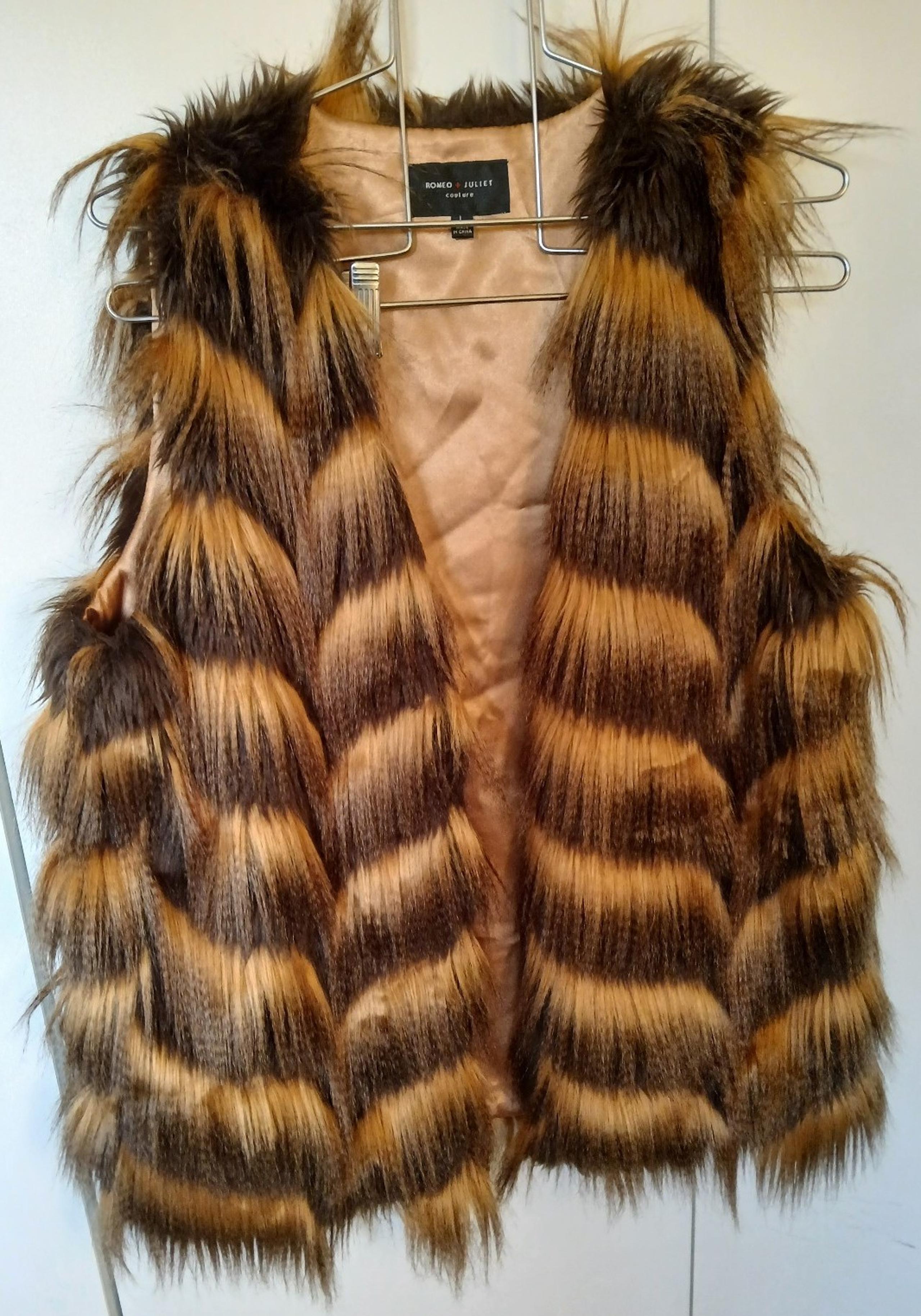 Great Looking Large Women Fault Fur vest Romeo & Juliet Couture shades of brown
