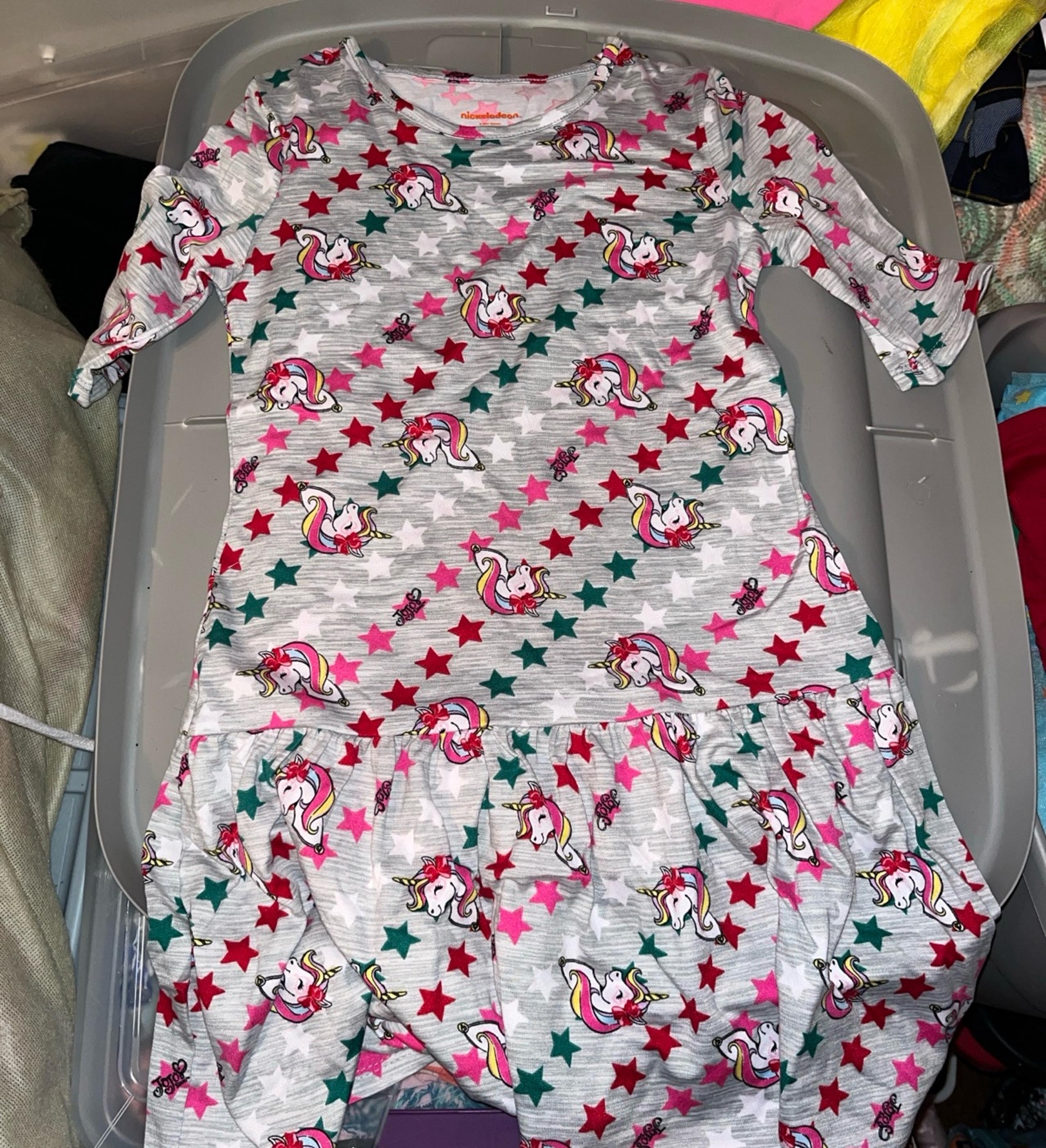 Nickelodeon JoJo Siwa dress size M 7/8

Unicorns and JoJo as cartoons on the