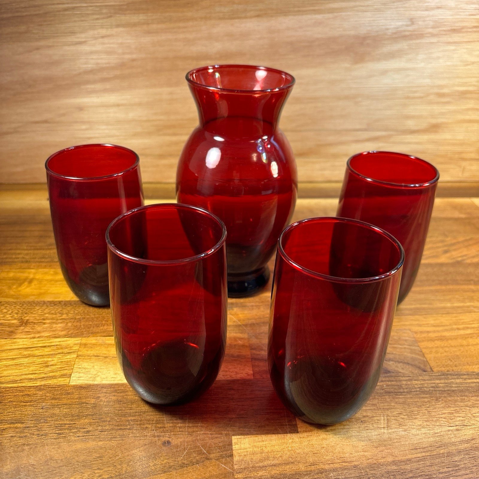 RUBY RED VASE 6 1/2” TALL & 4 GLASSES 3 1/4” TALL