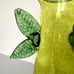 Ed Francis -Unique Green Glass Art Vase with Leaf Appliqué signed “Off Center”