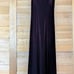 Long dress in the style of purple velvet.