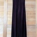 Long dress in the style of purple velvet.