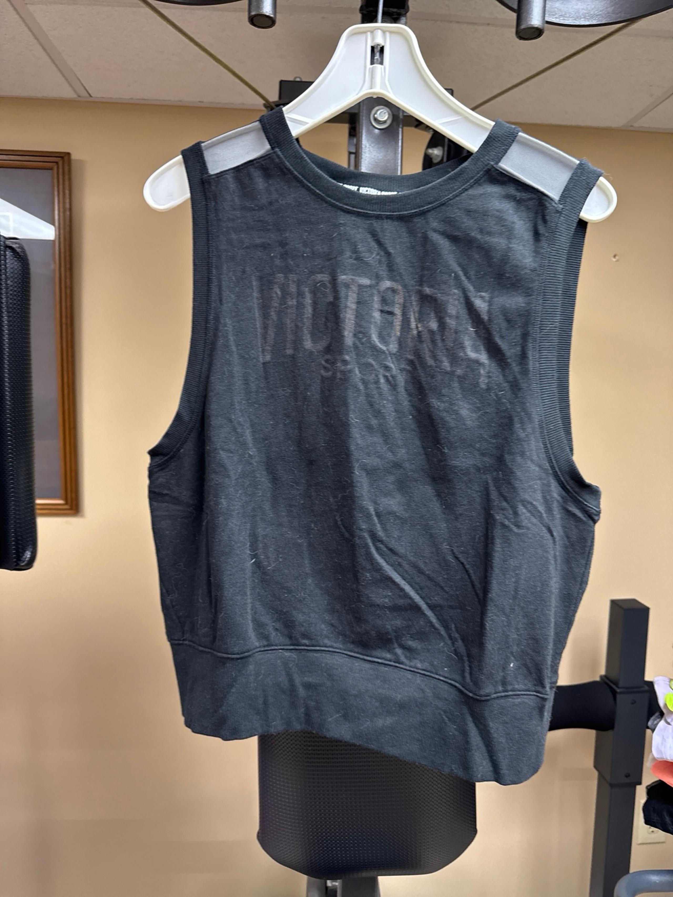 Victoria secret muscle shirt with lace shoulder. Open back shirt. Size medium