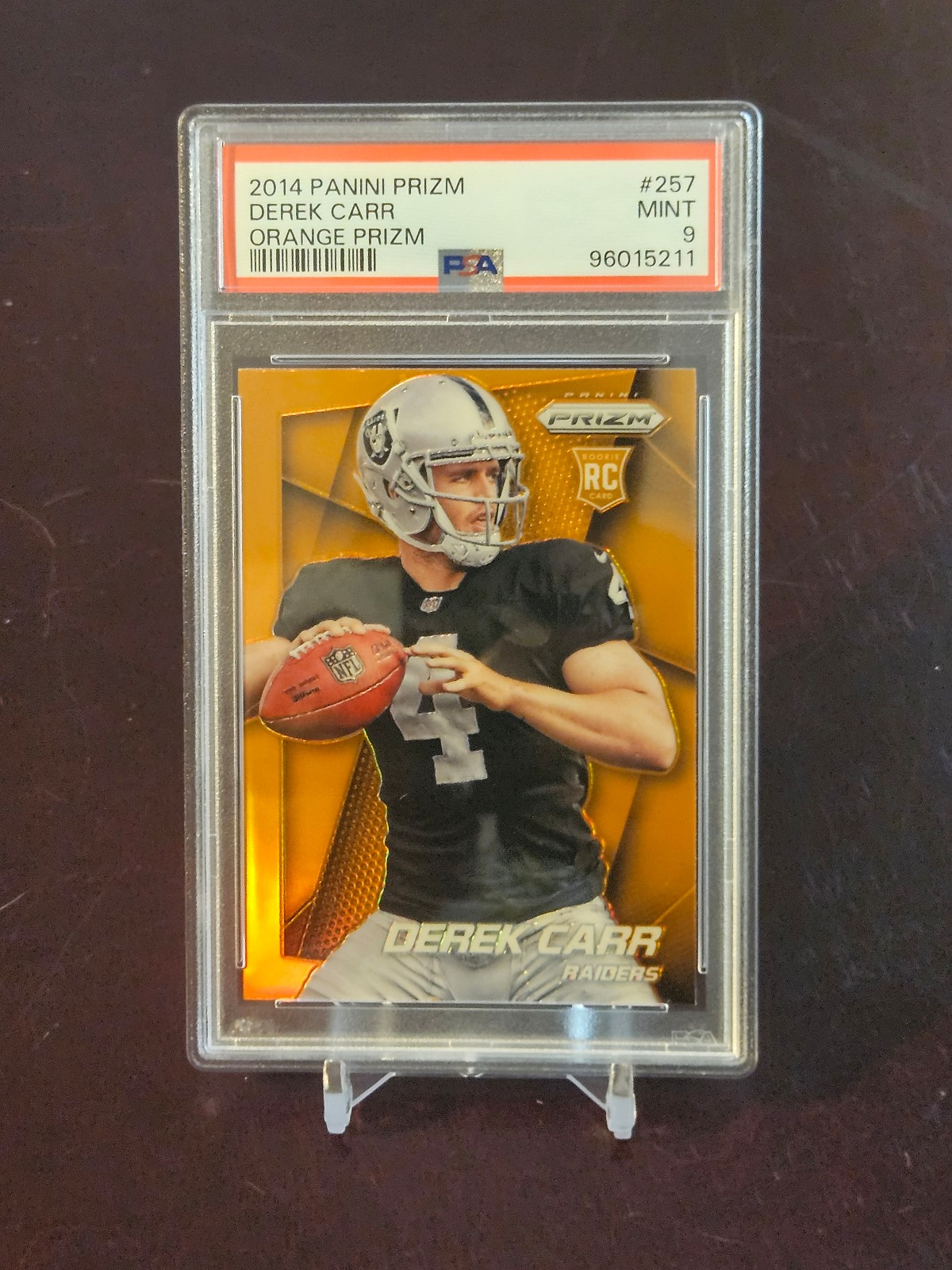 2014 PANINI PRIZM #257 DEREK CARR ROOKIE ORANGE RC FACING RIGHT PSA 9
