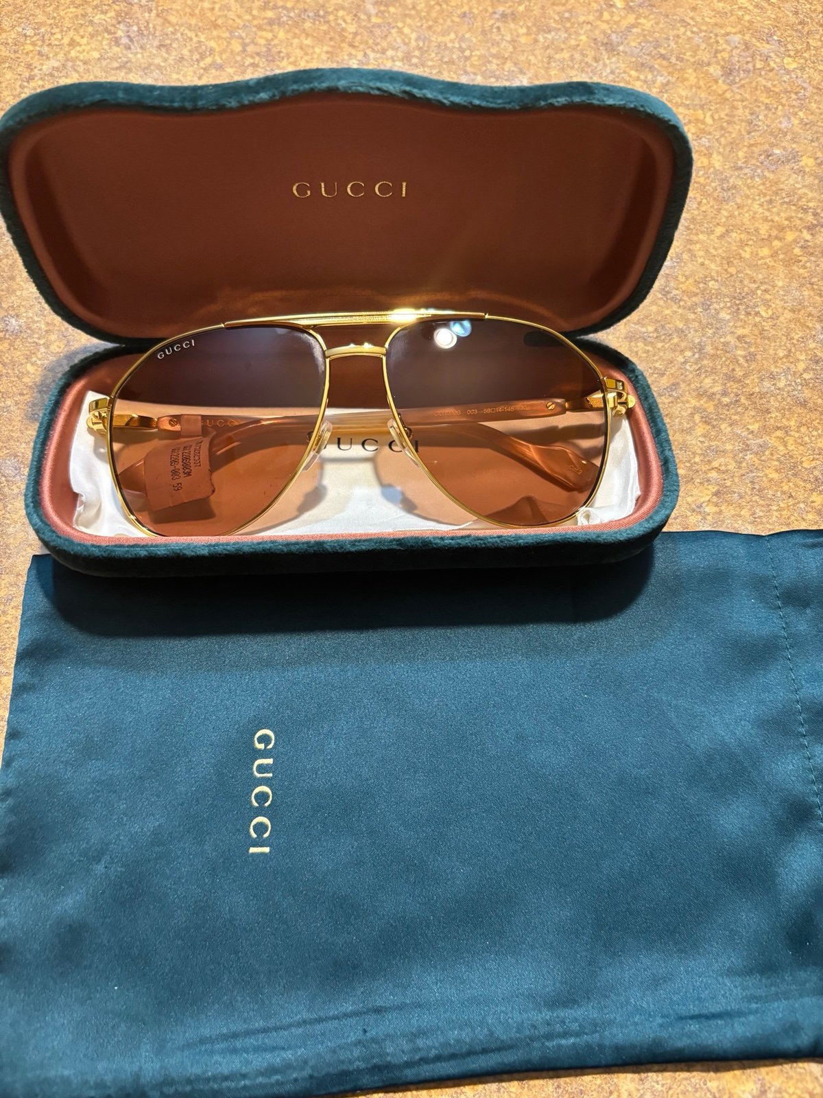 GUCCI GG1220S 003 sunglasses gold and brown aviator