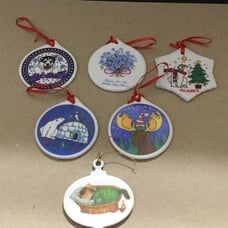Set of six porcelain desk ornaments mostly Alaskan