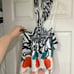 NEW STAUD halter pattern orange bow top