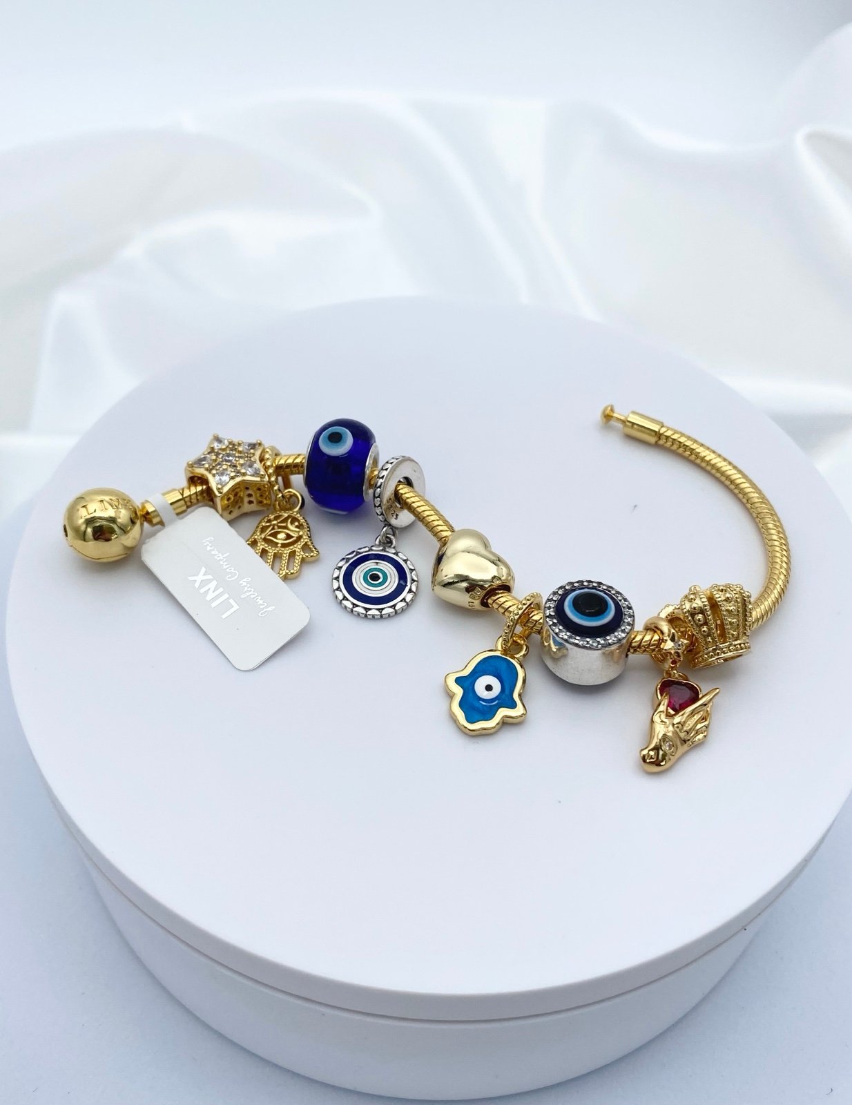 Linx Yellow Gold Snake Chain Bracelet with Hamsa Hand and Evil Eye Themed Charms