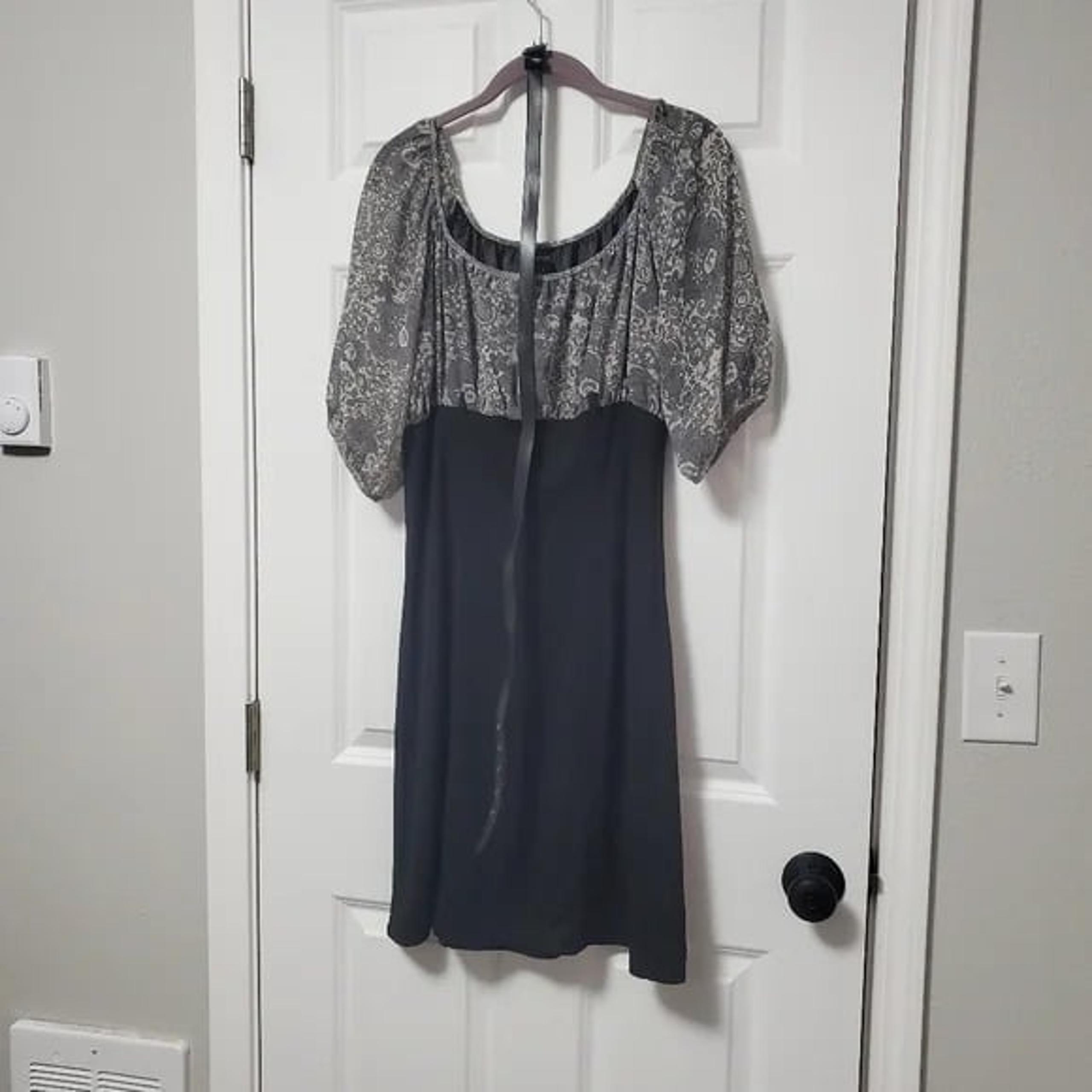 New with Tags Max Edition Empire waist dress with floral bodice and sleeves.
