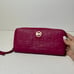 MICHAEL KORS Logo Embossed Pink Leather Zip Around Continental Wallet