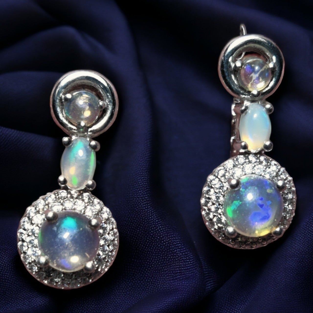 NEW 18K white gold over sterling natural Ethiopian opal earrings.