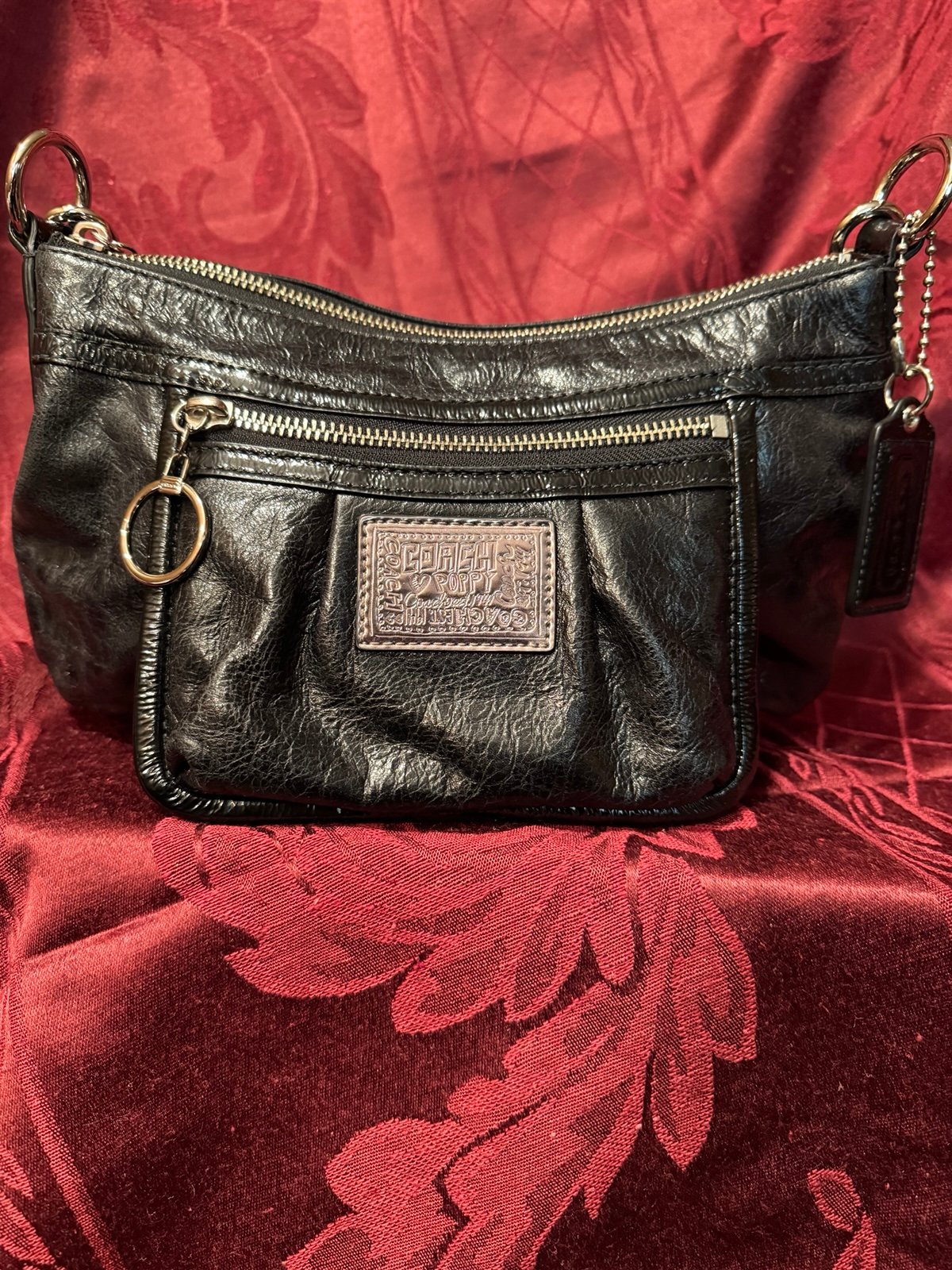 Coach Poppy Signature sufflette  black patent leather mini bag