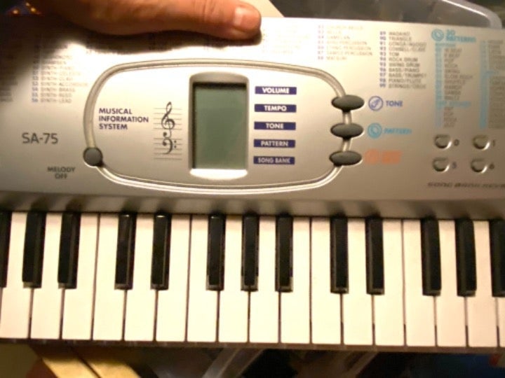 Keyboard mini piano by Casio, 100 tunes, add on sounds