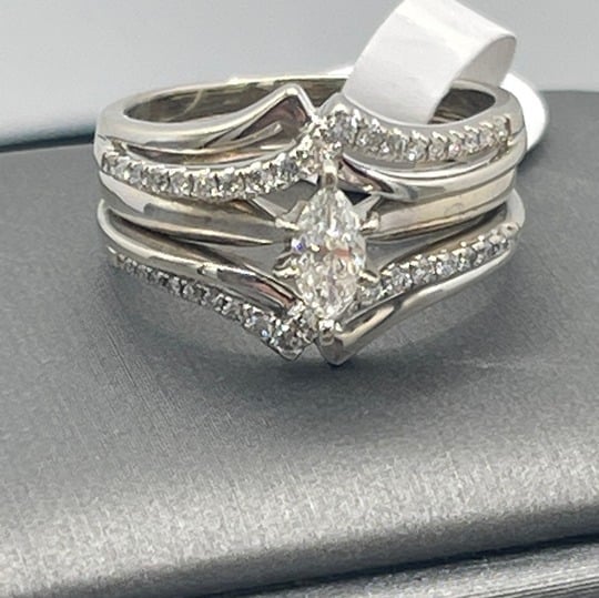 14 Karat White Gold Marquise Diamond Ring With Accenting Diamonds