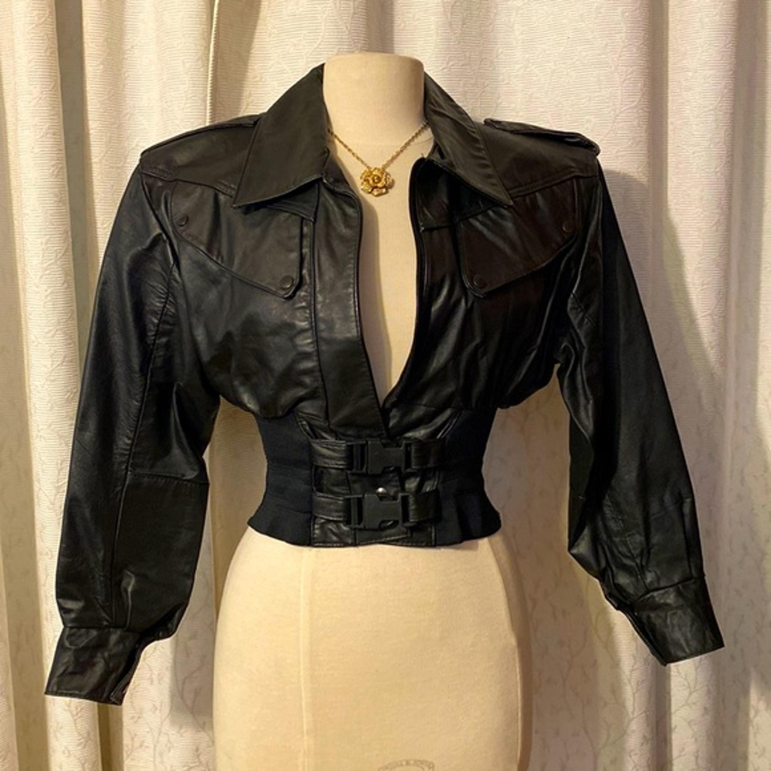 Vintage 1980's genuine Leather puff sleeve jacket. Made in the USA.