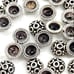 Lot of 14 Sterling Bali bead caps. Sv37
