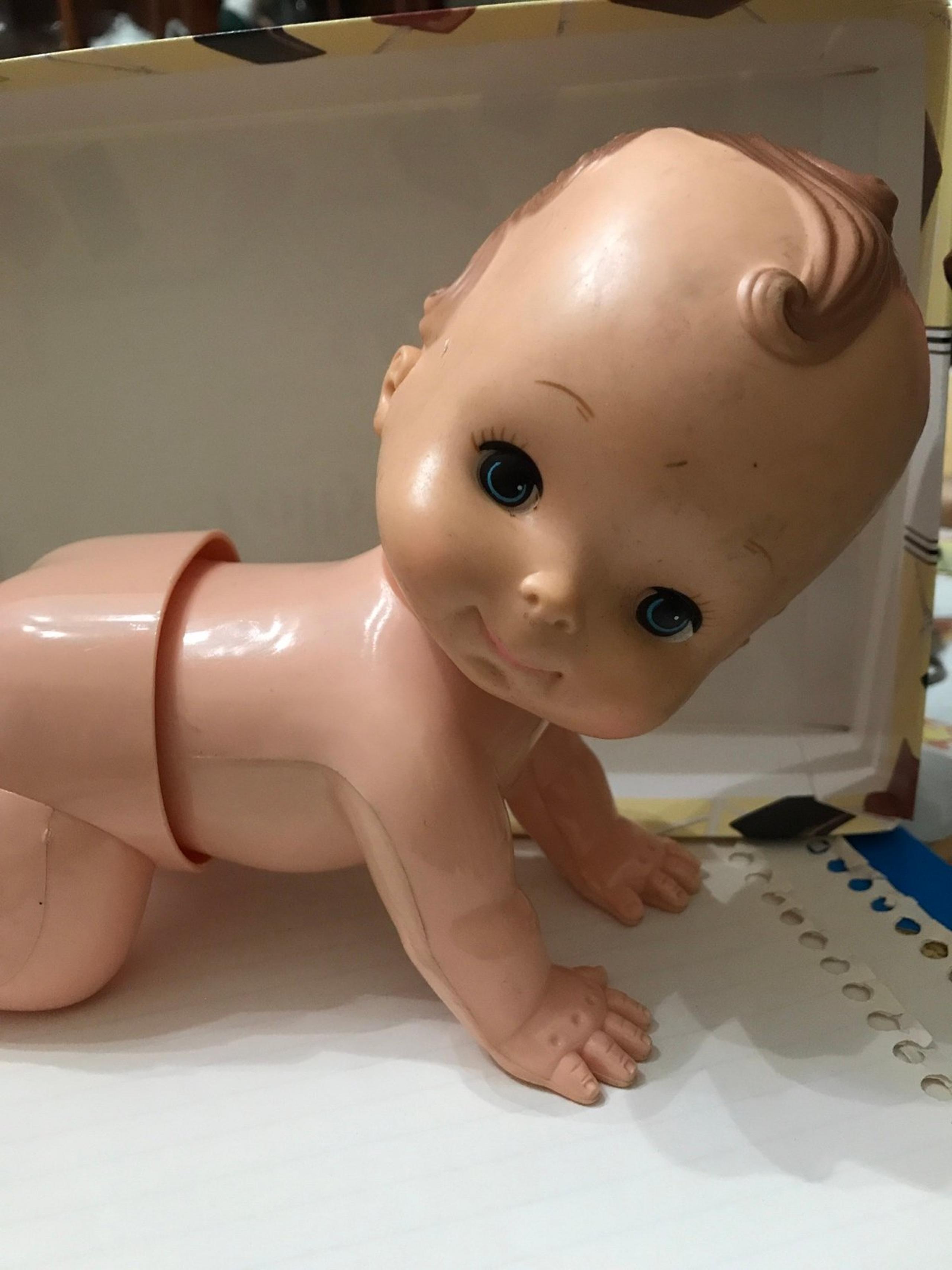 Vintage crawling baby doll
