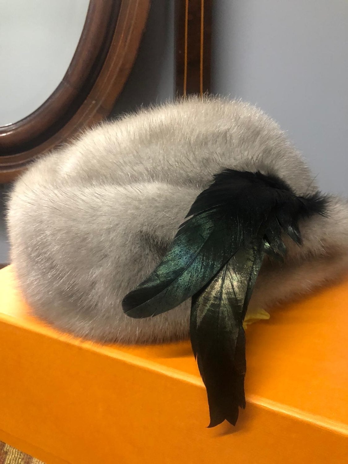 Mink fur hat with feather